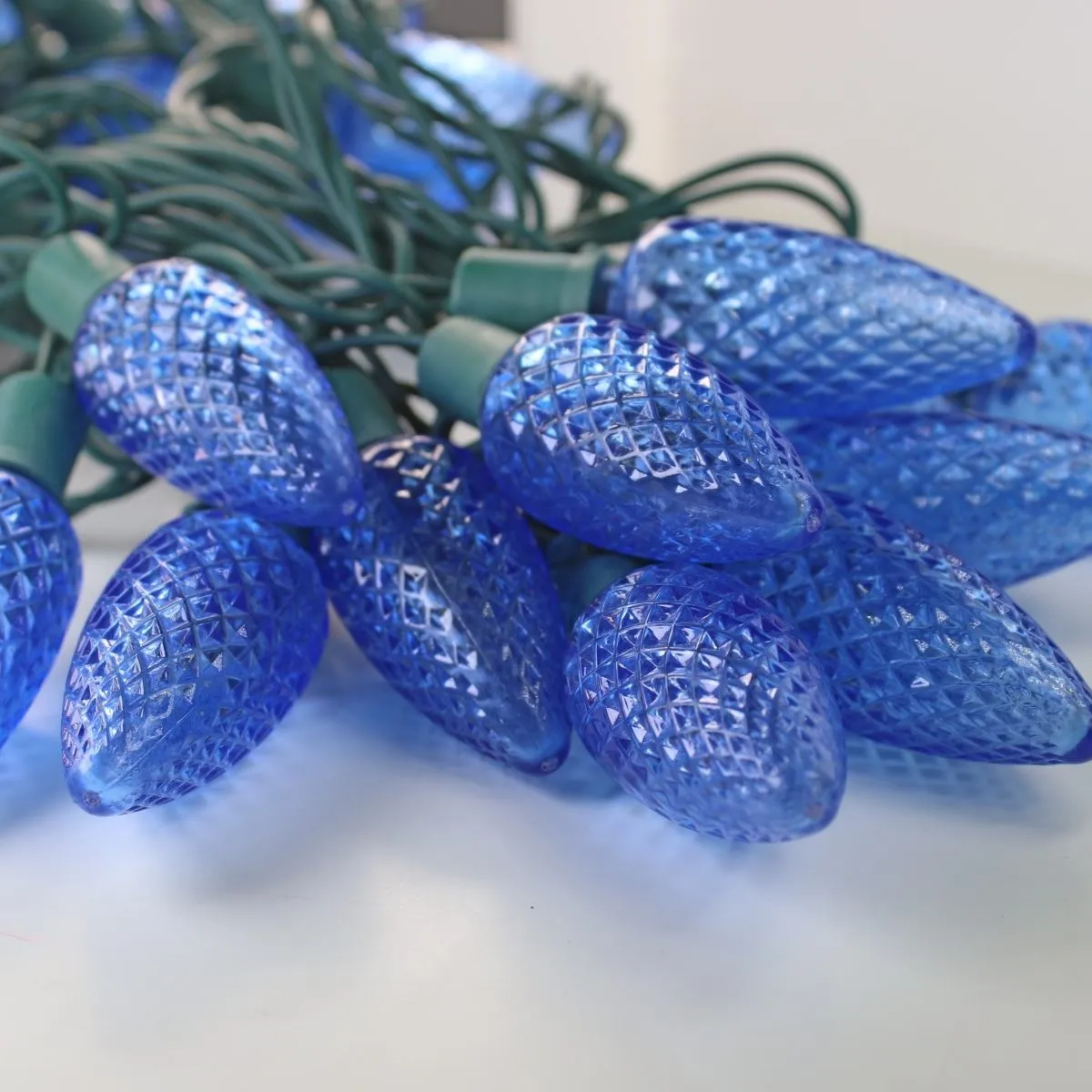 25-light C9 Blue LED Christmas Lights, 8" Spacing Green Wire